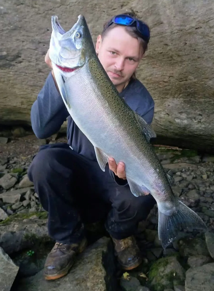 Corey Ziehm with coho salmon